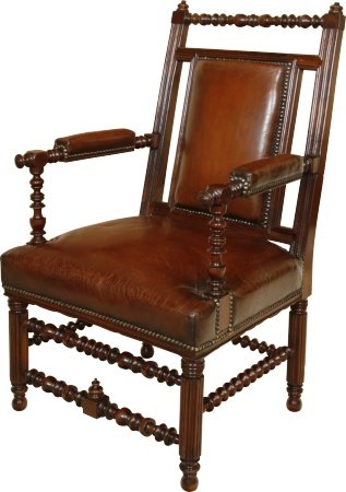 A stunning pair of 19th century open arm chairs