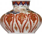A blue gold and red balloon vase c1900