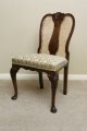 A pair of Queen Anne style walnut chairs